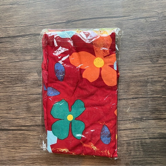 LuLaRoe Leggings OS ~ fun abstract floral print on a dark red background - Picture 1 of 3